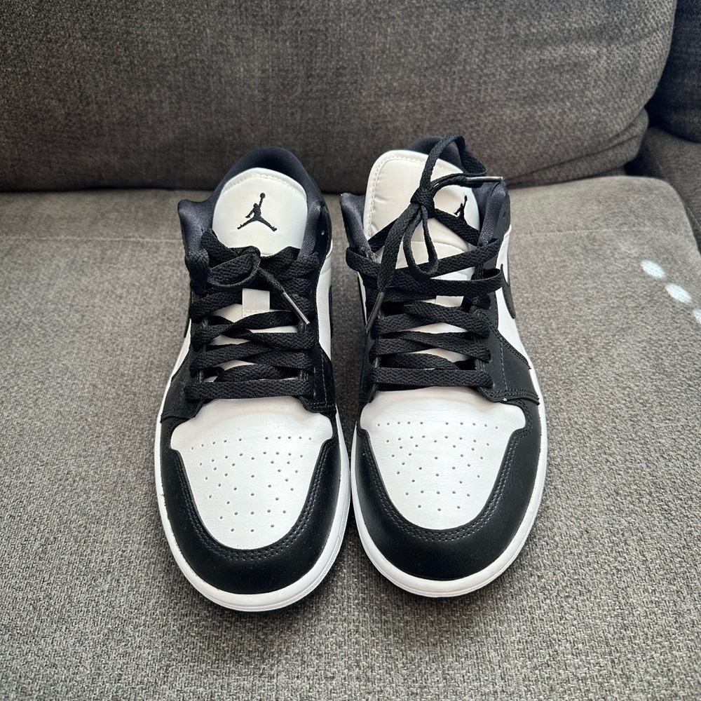 Women’s air Jordan 1’s low, black and white.